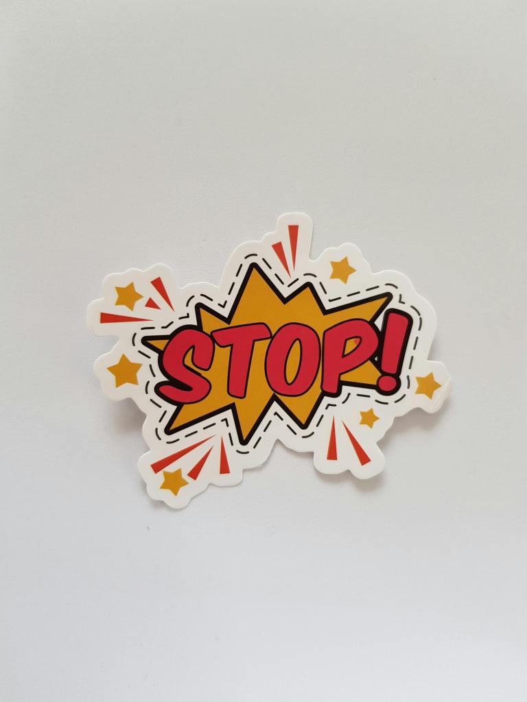 A sticker that says "Stop!"